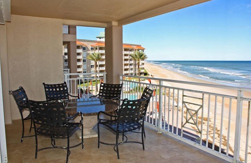 New Smyrna Beach Condo | Rare three bedroom end condo. Two bedrooms face the ocean with private balcony from Master bedroom.