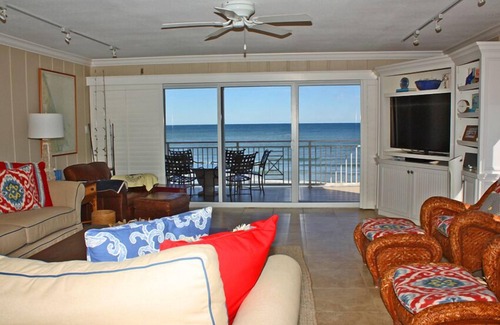 New Smyrna Beach Condo | Rare three bedroom end condo. Two bedrooms face the ocean with private balcony from Master bedroom.
