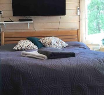Vehmersalmi Ski Chalet | Rauhaa ja rantaa kaipaavalle mökki rannalla