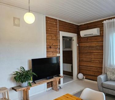 Muurame Apartment | Rauhallinen asunto maalla, navetan päädyssä.