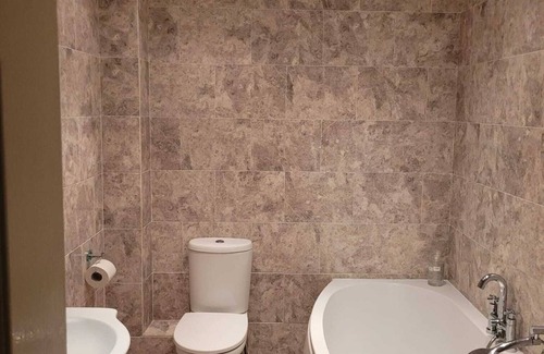 Sherborne St. John House | Reasonably large room with luxurious bathroom and a fitted kitchen