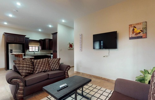 Belama Phase 3 House | Recently constructed home with enclosed yard, full kitchen, entertainment & WiFi