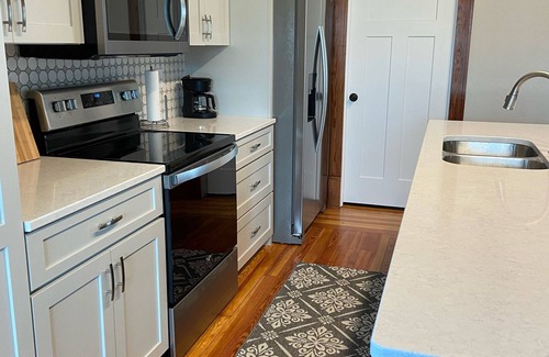 Cascade House | Recently renovated 2-story 3 bedroom house next to river & falls in Cascade, IA