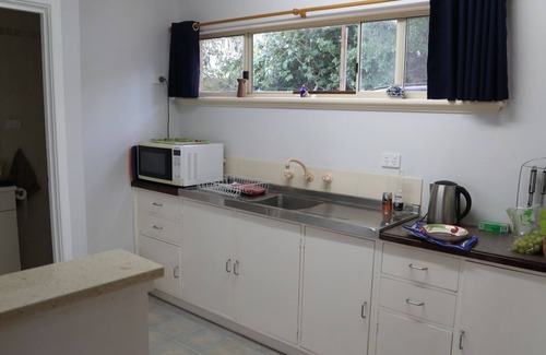 Halls Head Apartment | Recently renovated couples Retreat. Water views. Huge deck with tree in middle.