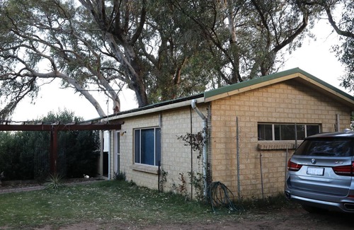 Halls Head Apartment | Recently renovated couples Retreat. Water views. Huge deck with tree in middle.