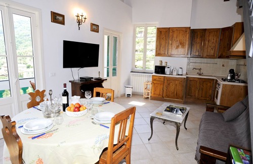 Pigna Apartment | Recently Renovated Flat In The Heart Of Pigna With Panoramic Views and a Balcony