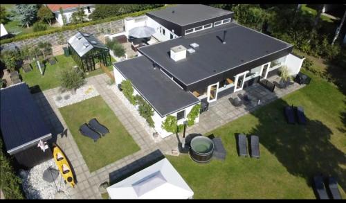 Faxe Ladeplads House | Recharging luxury stay for maksimum 4 people with magnificent sea view NO BREAKFAST - One bathroom - Hottub open from 15April-1November