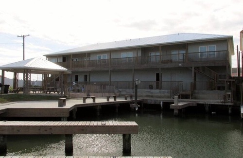 Port Mansfield Condo | Red Fish Condo B, with boat slips and pool.