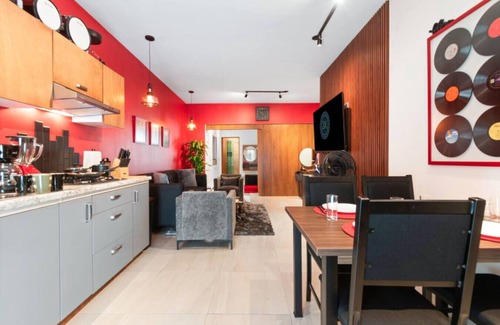 Durango Apartment | Red Vibe Music Decor | King Bed + Parking + Office
