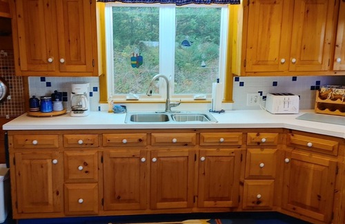 Bayville Cottage | Redbird Cottage. Charming respite w/large wrap-around porch and ocean views