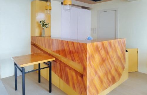 Pavia Hotel | RedDoorz @ Benelio Suites Pavia Iloilo