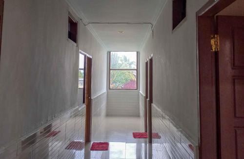 Poso Hotel | RedDoorz near Poso City Mall