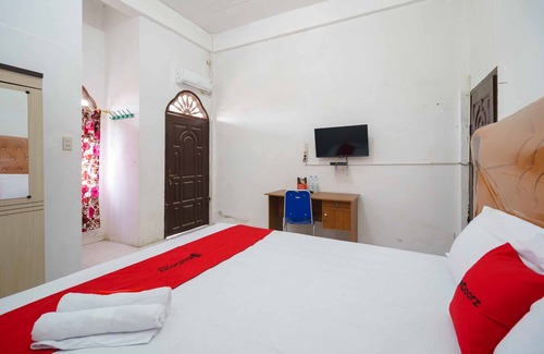 Kisaran Timur Hotel | RedDoorz Syariah near Stasiun Kereta Api Kisaran