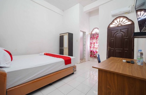 Kisaran Timur Hotel | RedDoorz Syariah near Stasiun Kereta Api Kisaran