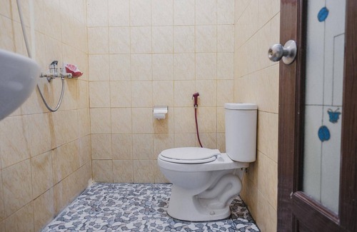 Gunung Sugih Hotel | RedDoorz Syariah near Kebun Raya Liwa