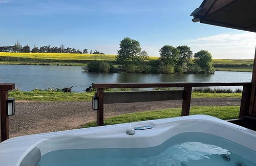 Cornhill on Tweed Ski Chalet | Redwood Lodge - Idyllically situated Lakeside & private hot tub fishing riding