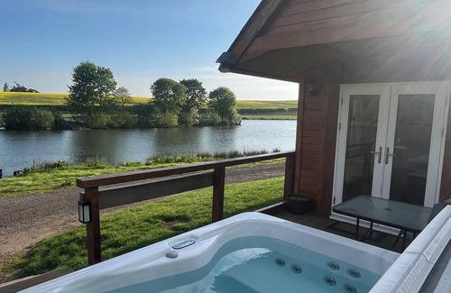 Cornhill on Tweed Ski Chalet | Redwood Lodge - Idyllically situated Lakeside & private hot tub fishing riding