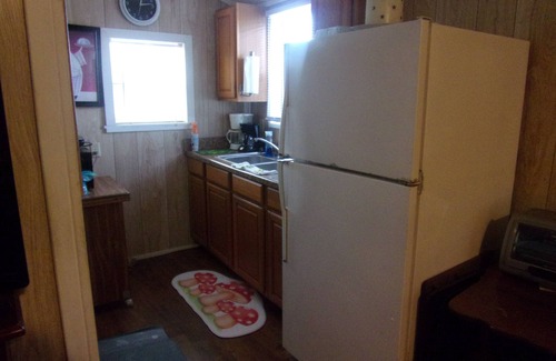 Hemphill Cabin | Reel Em In! Small, clean cabin set back from water on WF property w/boathouse