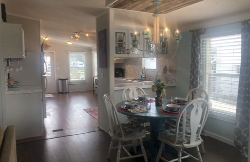 Indian Harbor Estates House | Reel Paradise Cottage- Canal Front- Bring your Boat to our 50’ Dock!