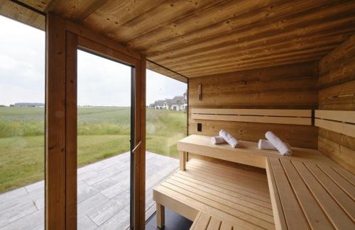 Dranske Villa | Reetland am Meer - LuxusPlus Reetdachvilla mit 4 Schlafzimmern, Außensauna, Loungebereich und Kamin G07