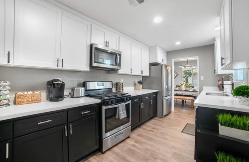 Stockton House | Refreshing 3 bedroom w/ Big Yard + Hot Tub + Garage Parking