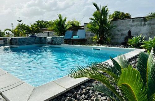 Ducos Apartment | Refuge PêBê Joli logement au coeur d'un immense jardin tropical