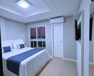 Guarapari Apartment | RefugioBacutia- Prédio FRENTE MAR Bacutia- 6 pessoas- 3 Quartos com AR sendo 1 suite - varanda- sala de estar e jantar Ampla -Piscina e Sauna no Prédio
