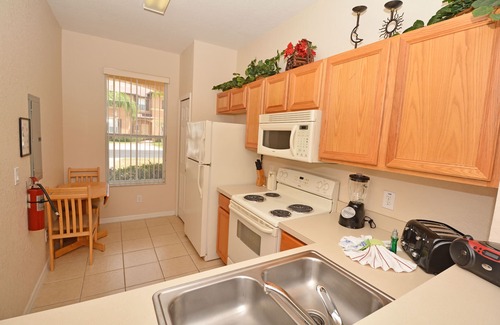 Wellington House | Regal Palms Resort Communal Pool, Arcade, Fitness Center & Tennis