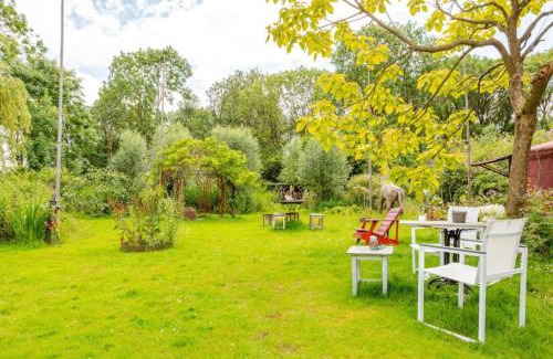 Zuidoost House | Reijgershof - Yurt Experience with garden view