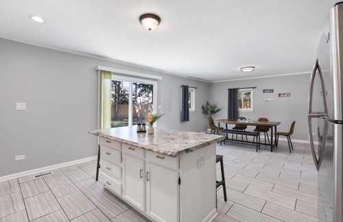 Romeoville House | Rejuvenate: 4BR, Fenced yard