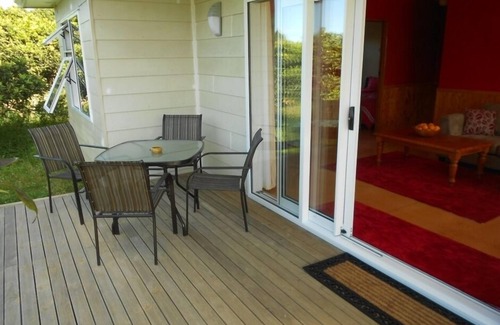 Kerikeri Cottage | Relax a Lodge MoonShine 2 Bedroom Cottage: farm animals, pool, organic orchard!