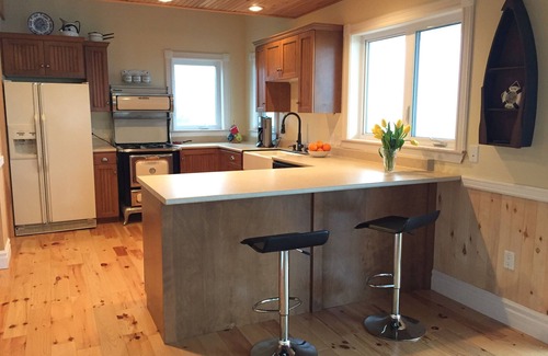 Souris House | Relax and enjoy the views from this waterfront gem!