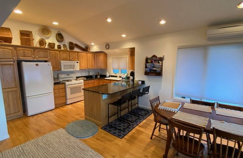 Lake Township House | Relax and play in the blue waters of Crystal Lake