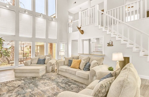 Seven Coves House | Relax and unwind on the deck with water view of Lake Conroe