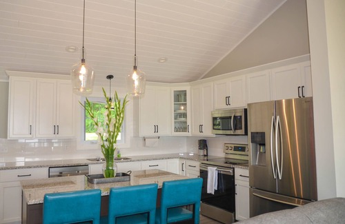 Rapid City House | Relax at our beautiful lakefront home located on the southern end of Torch Lake.