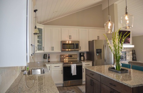 Rapid City House | Relax at our beautiful lakefront home located on the southern end of Torch Lake.