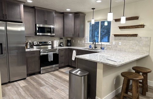 Tamarack Resort House | Relax at our Waterfront Hot Tub Near Tamarack - NEW