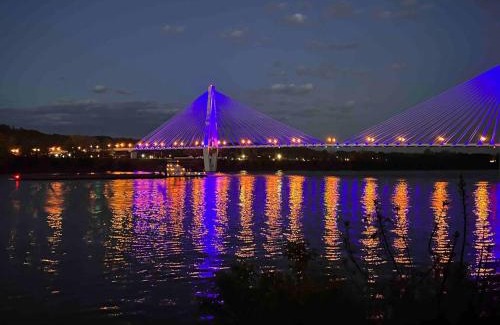 Russell House | Relax at Rivertime with a Bridge and River view, plus a HotTub