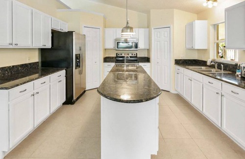 Vero Beach House | Relax at the pool and beach and rental boat available close by
