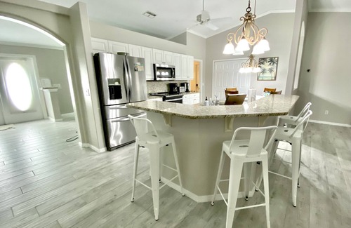 Burnt Store House | Relax! Canal Home, Sunsets, Heated Pool, Lanai with TV, Boat Dock, Gulf Access