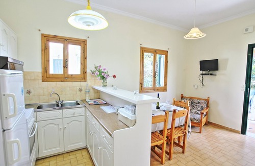 Kalami Apartment | Relax in Comfort by the Sea: Zoulis Sofia Corfu Apartment