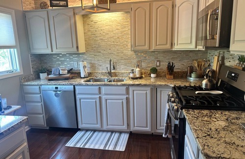 Augusta House | Relax in River Retreat: Masters or Iron Man