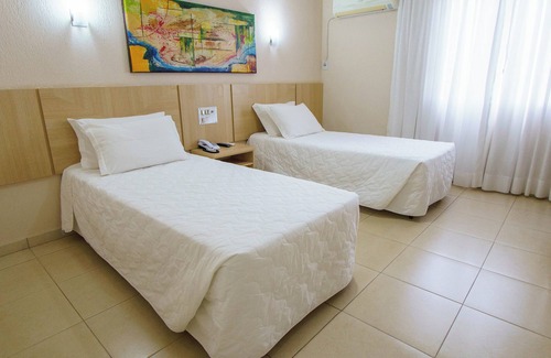 Foz do Iguacu City Centre Hotel | Relax in Style: Twin Comfort for Friends and Families Exploring Iguazu Wonders