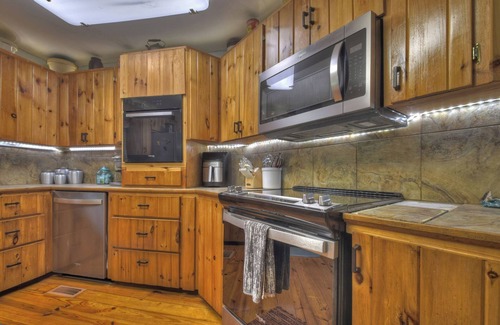 Epworth Cabin | Relax in the hot tub with sounds from the nearby creek! - Bear Naked Hideaway