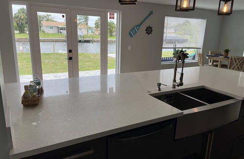 Edgewater House | Relax near Port Charlotte Beach Park-12 min walk-luxury waterfront- private dock