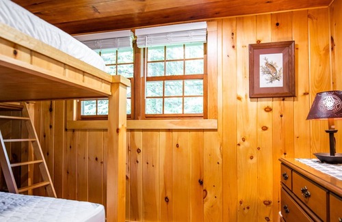 Laporte House | Relax on the covered porch at "J.C.'s Bunkhouse" at Lake Mokoma