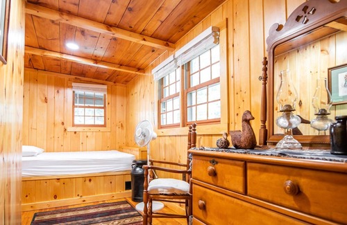 Laporte House | Relax on the covered porch at "J.C.'s Bunkhouse" at Lake Mokoma