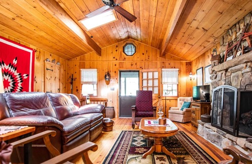 Laporte House | Relax on the covered porch at "J.C.'s Bunkhouse" at Lake Mokoma