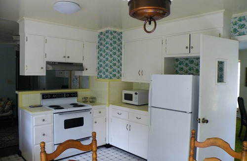 Woodbine House | Relax on the Screened Porch or Enjoy the Nearby Area Attractions