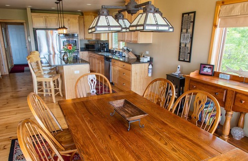 Egg Harbor House | Relax or do nothing at all high on the bluff with water views second to none.